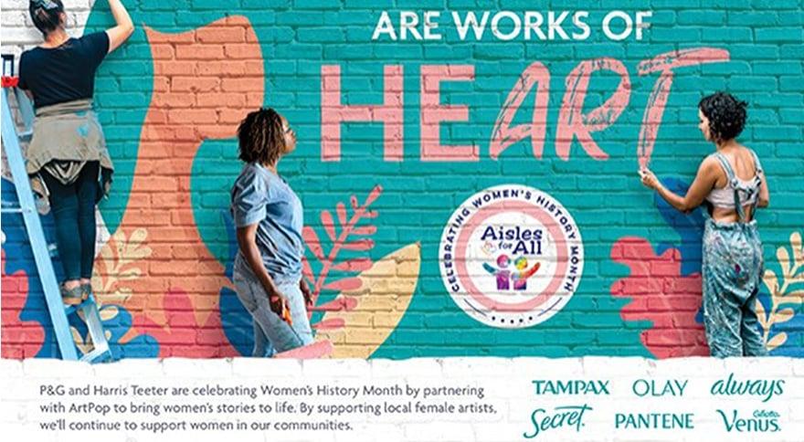 Picture of woman standing next to a mural