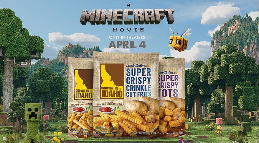 A Minecraft Movie landscape with a Creeper and a bee in the background with three bags of Grown in Idaho products. A Minecraft Movie movie date is April 4. Copyright 2025 Warner Bros. Ent. and Legendary. All Rights Reserved.